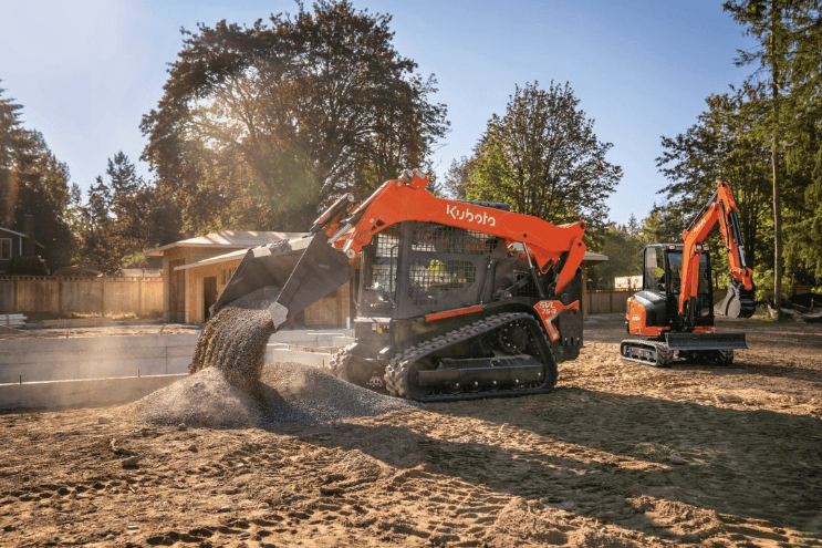 Track Loader dumping gravel