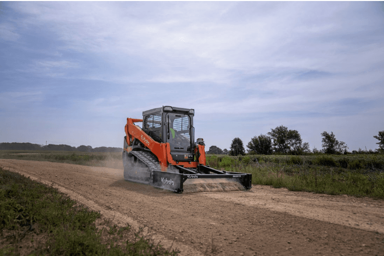 Track Loader using leveling attachment