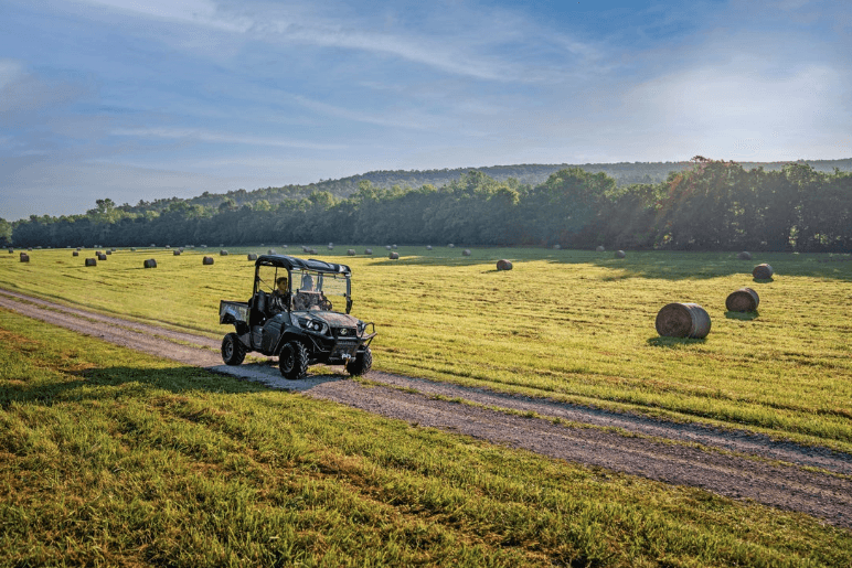RTV driving down dirt road
